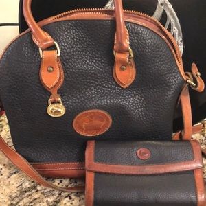 Dooney and Bourke hand bag with matching wallet.